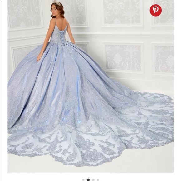 Dress she Never wore. It’s still in plastic and Box. The color is Ice Blue - Picture 2 of 6